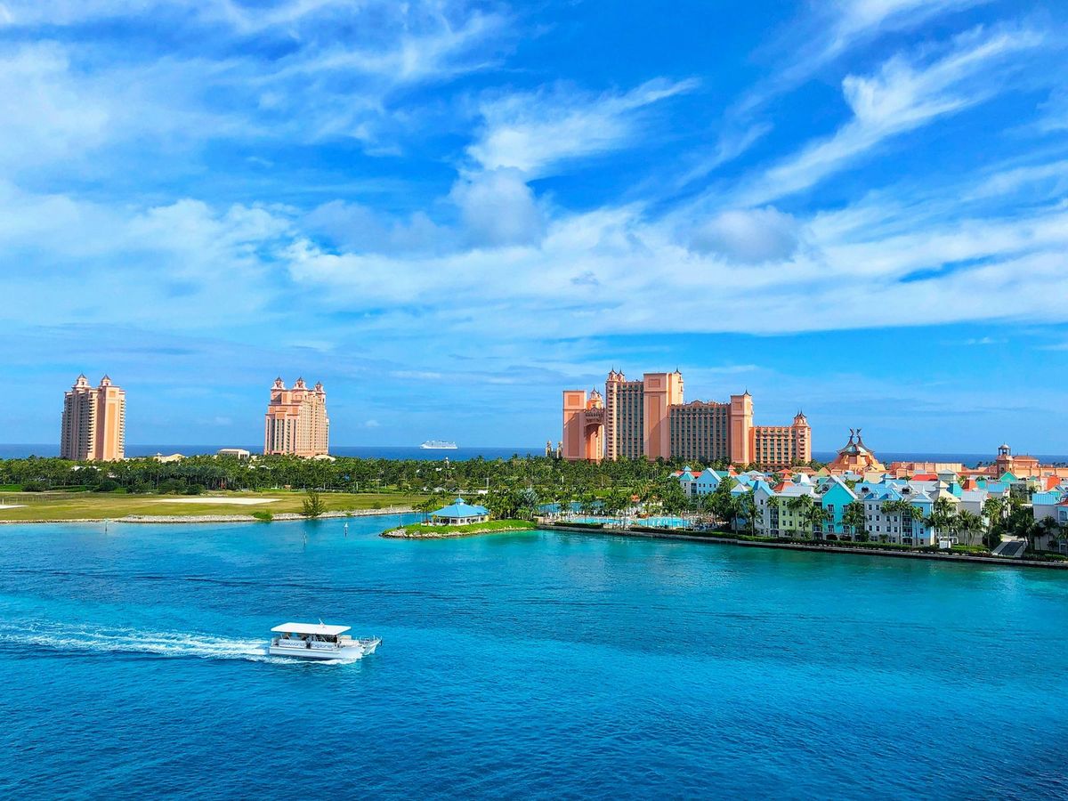 Bright blue water and colorful buildings on Paradise Island in Nassau, the Bahamas