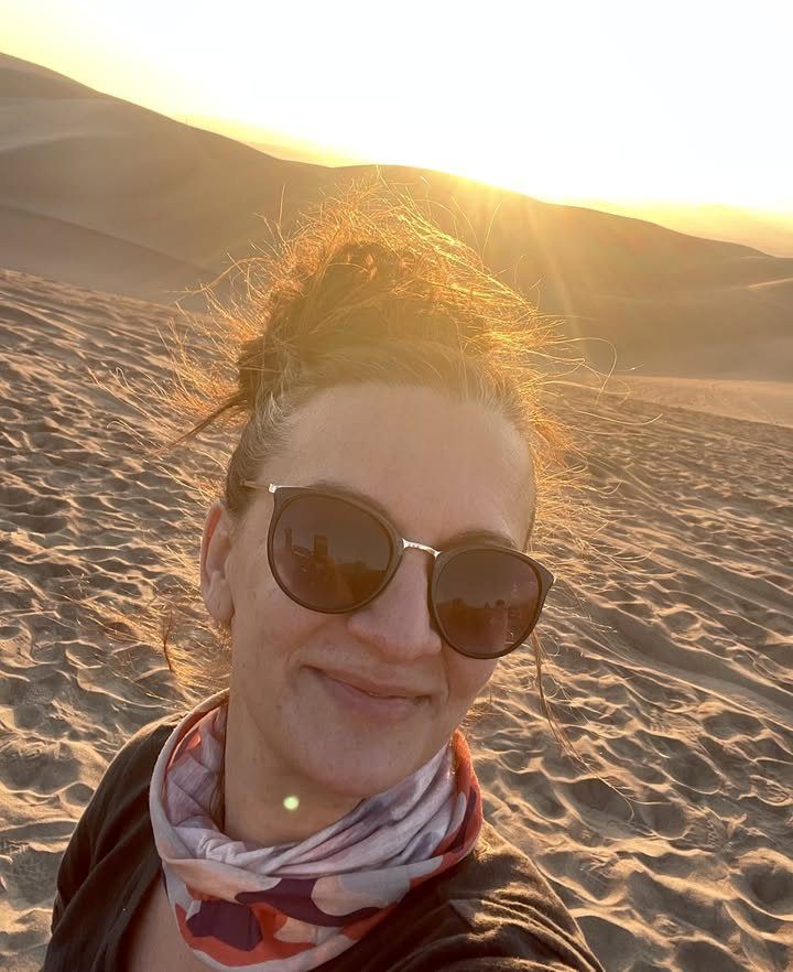 Libby Christoules at sunset in the Huacachina dunes, Peru