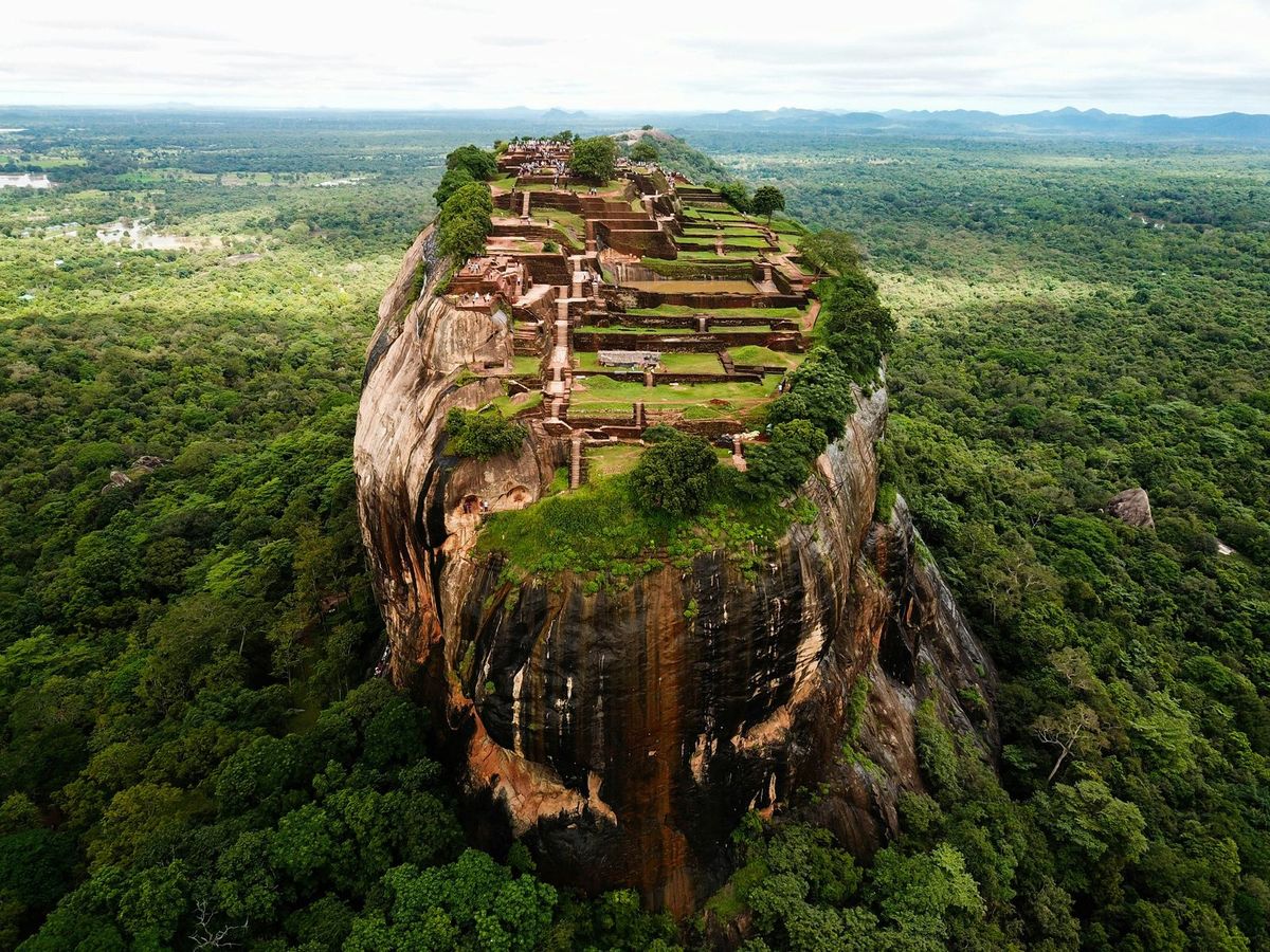 Aerial view of Sigiriya, an ancient rock fortress rising above the jungle in Sri Lanka